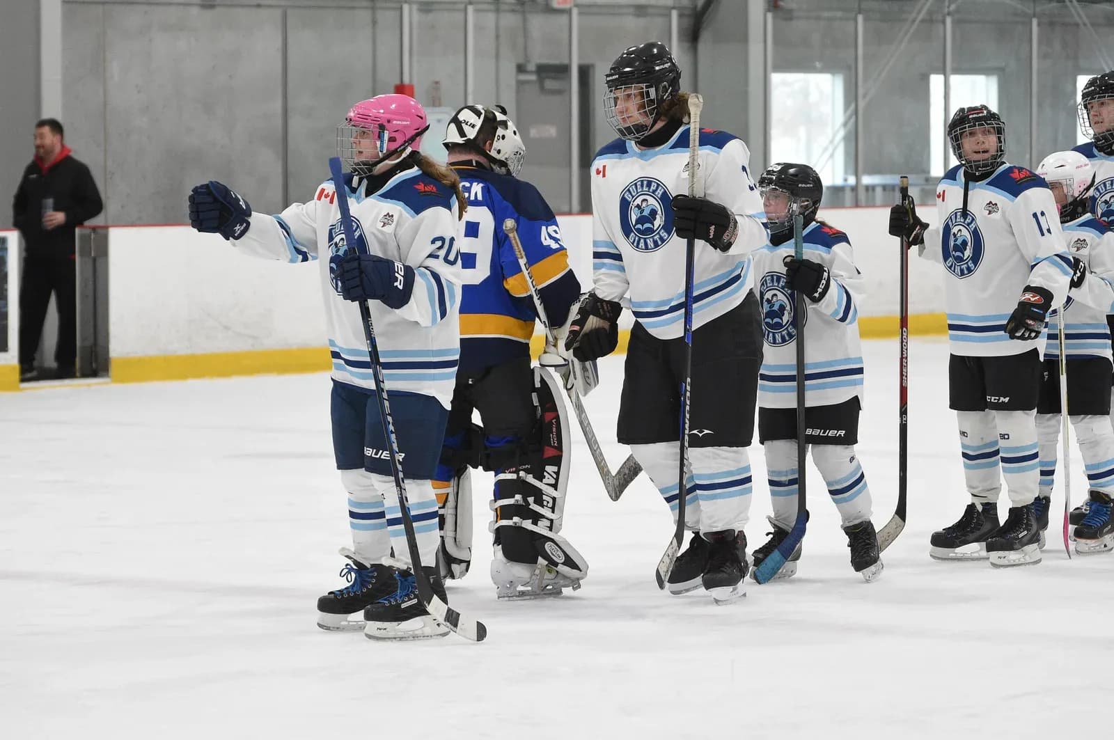 Guelph Giants athletes on the ice — donations keep hockey accessible